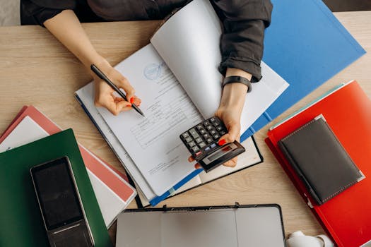 person reviewing budget on laptop