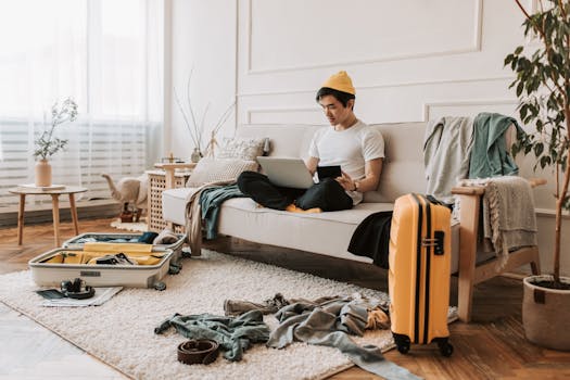 Person working on a laptop in a cozy setting