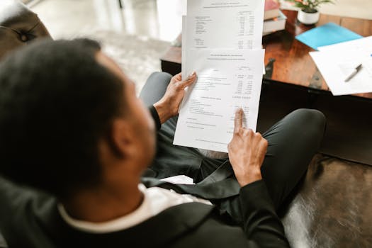 happy farmer reviewing tax documents