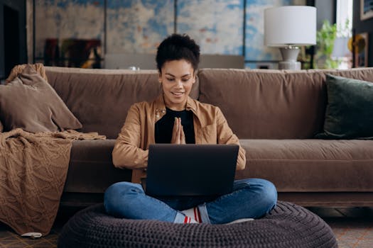 image of a person using a computer for budgeting